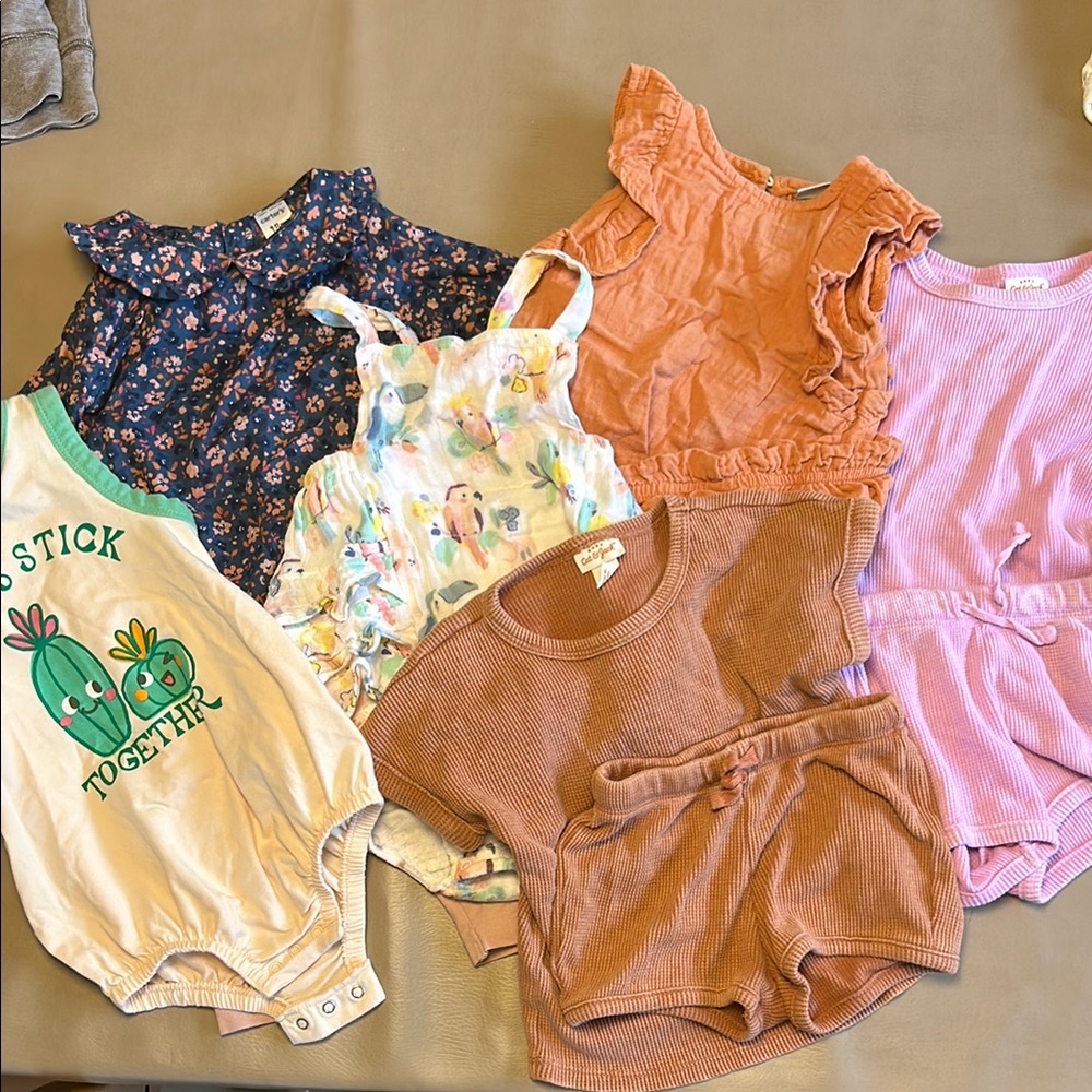 Assorted Baby Rompers and Outfits